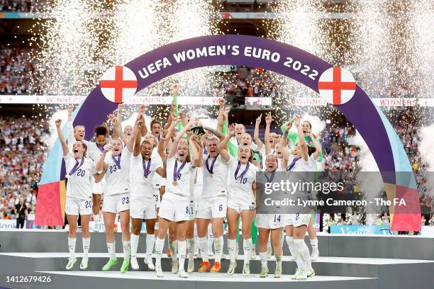 Players of England celebrate with the UEFA Women’s EURO 2022 Trophy after their side's victory during the UEFA Women's Euro 2022 final match between...