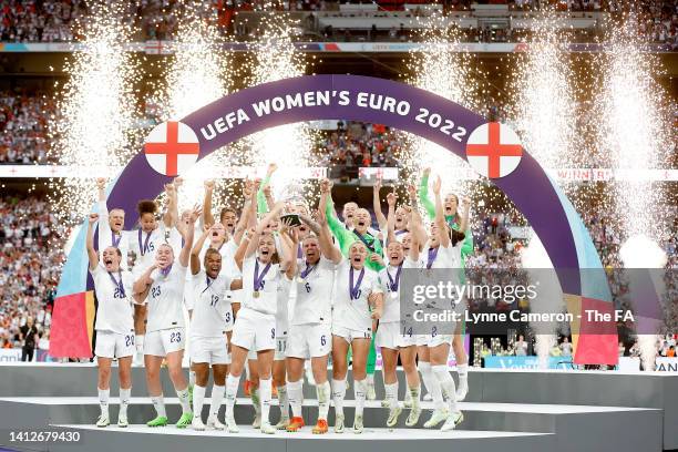 Players of England celebrate with the UEFA Women’s EURO 2022 Trophy after their side's victory during the UEFA Women's Euro 2022 final match between...