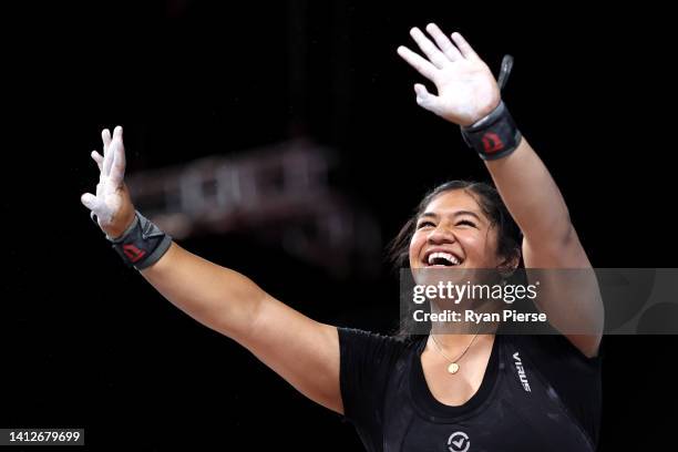 Kuinini Juanita Mechteld Manumua of Team Tonga celebrates after performing a snatch during the Women's 87+kg Final on day six of the Birmingham 2022...