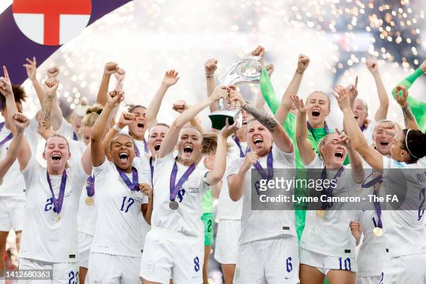 Players of England celebrate with the UEFA Women’s EURO 2022 Trophy after their side's victory during the UEFA Women's Euro 2022 final match between...