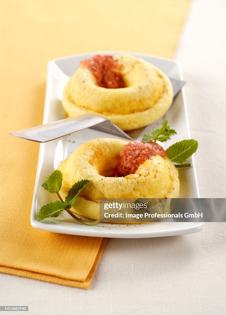 Ricotta flan with Pecorino cheese and tomato sauce