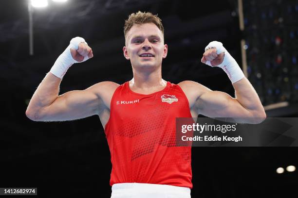 Lewis Richardson of Team England celebrates victory over Billy Poullain of Team Guernsey after the Men's Over 71kg75kg Quarter Final fight on day six...