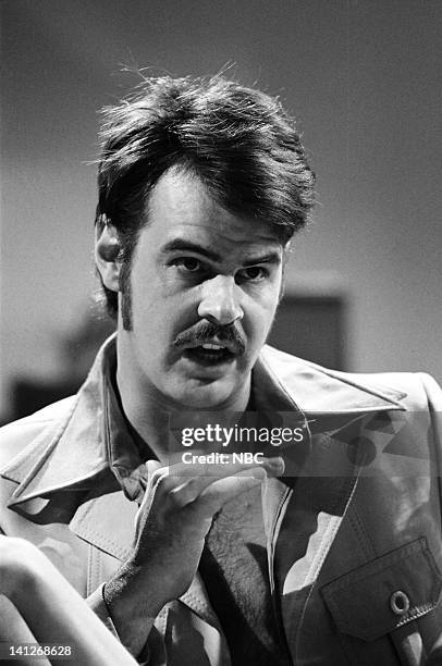 Episode 21 -- Pictured: Dan Aykroyd as Ricardo Montalban during the 'Continental Men' skit on May 14, 1977 -- Photo by: NBCU Photo Bank