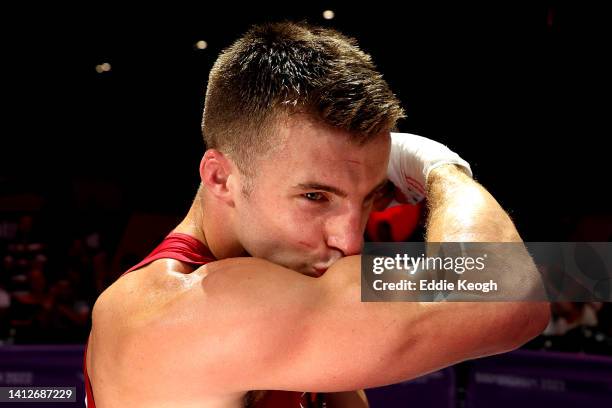 Sean Lazzerini of Team Scotland celebrates after defeating Keven Beausejour of Team Canada in the Men’s Boxing Over 75kg-80kg Light Heavyweight...