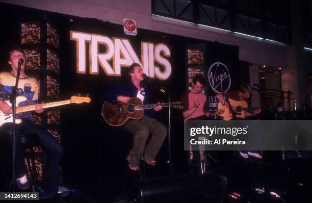 The band Travis perform at an in-store appearance at the Virgin Megastore at Union Square on June 26, 2001 in New York City.