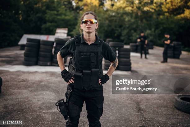 swat team soldier - bulletproof vest woman stock pictures, royalty-free photos & images