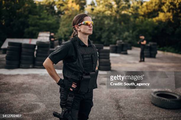 swat team soldier - military uniform stock pictures, royalty-free photos & images