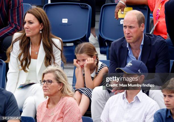 Catherine, Duchess of Cambridge, Princess Charlotte of Cambridge and Prince William, Duke of Cambridge watch the England v India Women's hockey match...