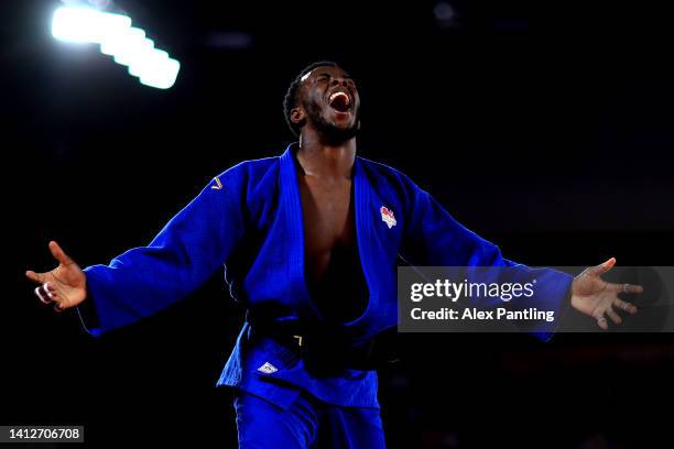 Jamal Petgrave of Team England celebrates after defeating Remi Feuillet of Team Mauritius in the Men's Judo 90 kg Final match on day six of the...