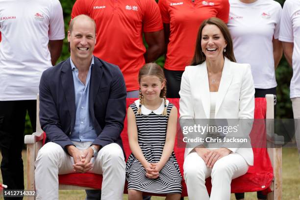Prince William, Duke of Cambridge, Catherine, Duchess of Cambridge and Princess Charlotte of Cambridge pose for a photograph as they visit Sportsid...