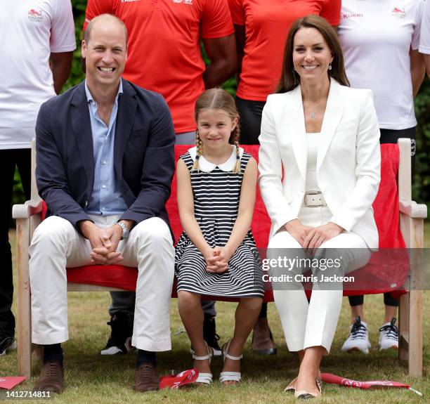 Prince William, Duke of Cambridge, Catherine, Duchess of Cambridge and Princess Charlotte of Cambridge pose for a photograph as they visit Sportsid...