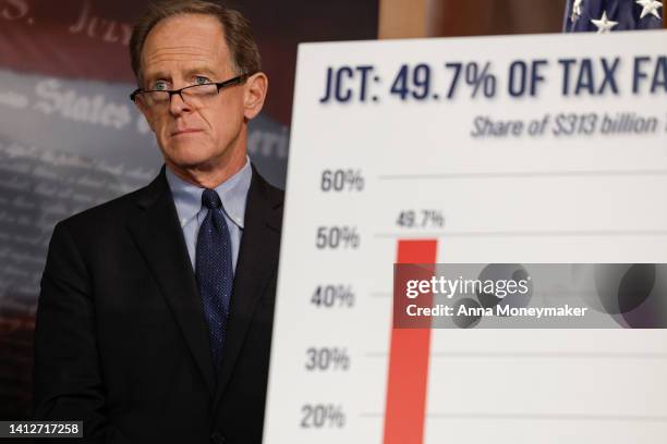 Sen. Pat Toomey listens during a press conference on taxes at the U.S. Capitol Building on August 03, 2022 in Washington, DC. Republican members of...