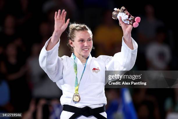 Gold medalist Emma Reid of Team England celebrates during the Women's Judo 78 kg medal ceremony on day six of the Birmingham 2022 Commonwealth Games...