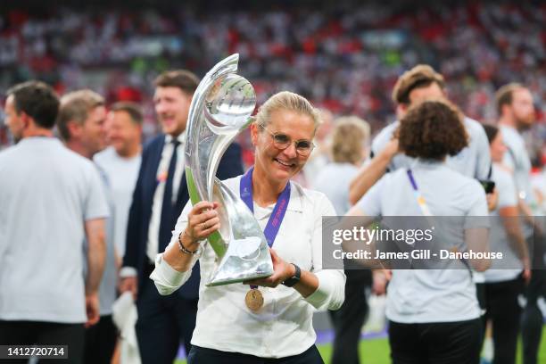 Sarina Wiegman, manager of the England National Womens Football Team, celebrates with the trophy following the UEFA Women's Euro England 2022 final...