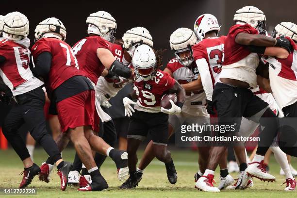 Running back Jonathan Ward of the Arizona Cardinals participants in a team training camp at State Farm Stadium on August 03, 2022 in Glendale,...