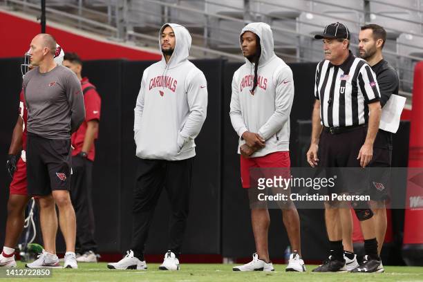 Running back James Conner and wide receiver DeAndre Hopkins of the Arizona Cardinals participant in a team training camp at State Farm Stadium on...