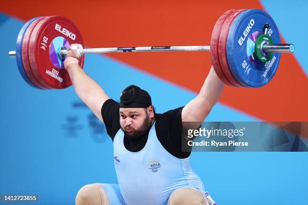 Singh Gurdeep of Team India performs a snatch during the Men's 109+kg Final on day six of the Birmingham 2022 Commonwealth Games at NEC Arena on...