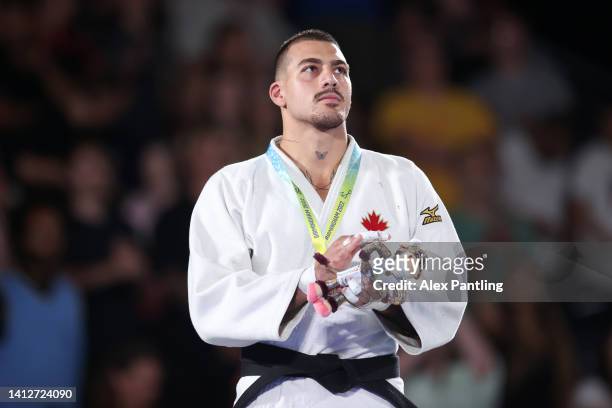 Gold medalist Shady Elnahas of Team Canada celebrates during the Men's Judo 100 kg medal ceremony on day six of the Birmingham 2022 Commonwealth...