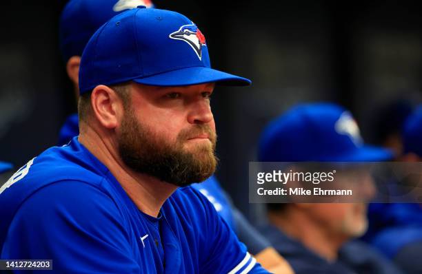 Interim Manager John Schneider of the Toronto Blue Jays looks on during a game against the Tampa Bay Rays at Tropicana Field on August 03, 2022 in St...