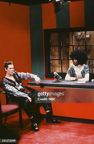 Episode 12 -- Pictured: Kevin Bacon as Vanilla Ice, Chris Rock as Nat X during the 'The Dark Side' skit on February 9, 1991 -- Photo by: Raymond...