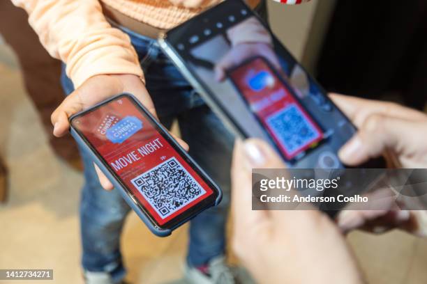 use of movie ticket with qr code - theatre program stock pictures, royalty-free photos & images