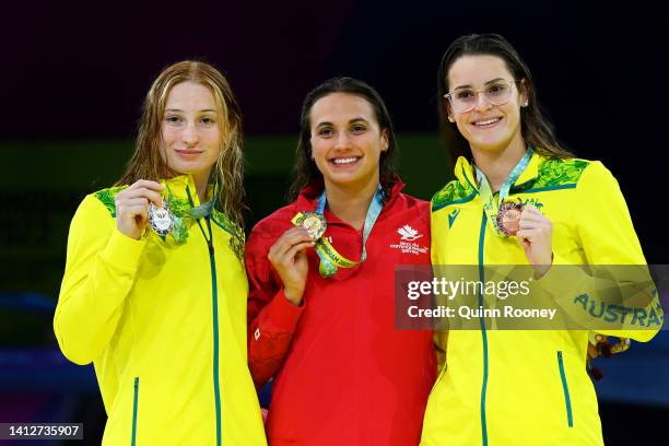 Silver medalist, Mollie O'Callaghan of Team Australia, Gold medalist, Kylie Masse of Team Canada and Bronze medalist, Kaylee McKeown of Team...