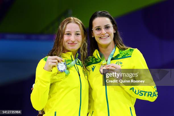 Silver medalist, Mollie O'Callaghan of Team Australia and Bronze medalist, Kaylee McKeown of Team Australia pose with their medals during the medal...