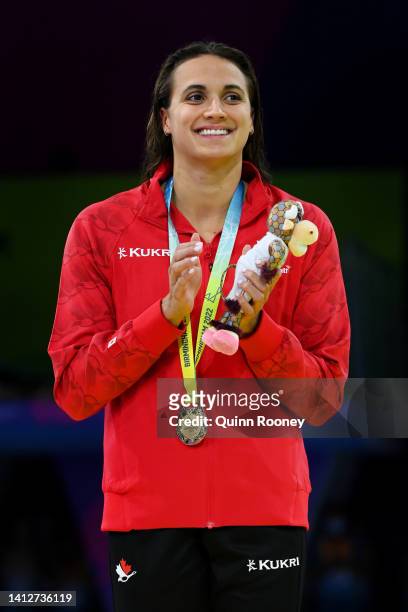 Gold medalist, Kylie Masse of Team Canada poses with their medal during the medal ceremony for the Women's 50m Backstroke Final on day six of the...