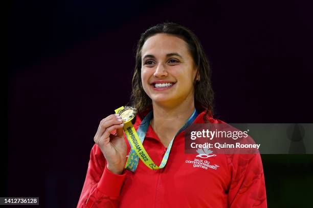 Gold medalist, Kylie Masse of Team Canada poses with their medal during the medal ceremony for the Women's 50m Backstroke Final on day six of the...