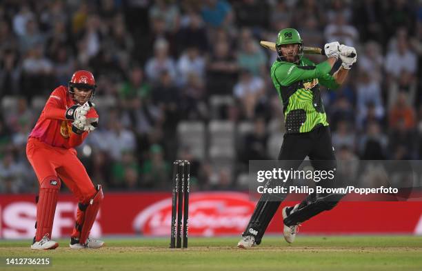 James Vince of Southern Brave hits out watched by Joe Clarke of Welsh Fire during The Hundred match between Southern Brave and Welsh Fire at Ageas...