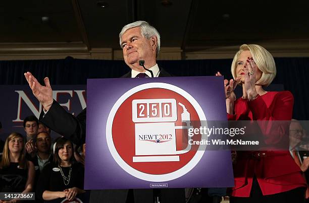 Republican presidential candidate and former Speaker of the House Newt Gingrich speaks at an election night party with his wife Callista March 13,...