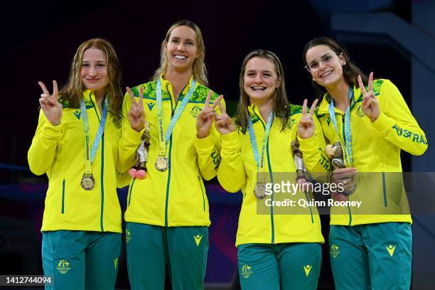 Gold medalists, Kaylee McKeown, Chelsea Hodges, Emma McKeon and Mollie O'Callaghan of Team Australia pose with their medals during the medal ceremony...