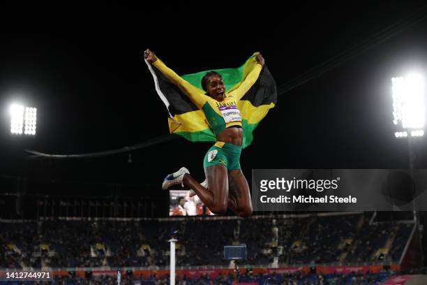 Elaine Thompson-Herah of Team Jamaica celebrates after winning the gold medal in the Women's 100m Final on day six of the Birmingham 2022...