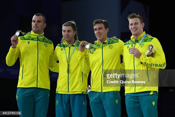 Silver medalists, Bradley Woodward, Zac Stubblety-Cook, Matthew Temple and Kyle Chalmers of Team Australia pose with their medals during the medal...