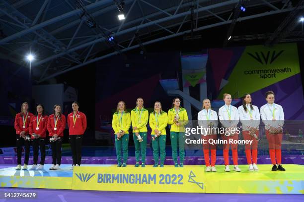 Silver medalist, Kylie Masse, Sophie Angus, Margaret Macneil and Summer McIntosh of Team Canada, Gold medalists, Kaylee McKeown, Chelsea Hodges, Emma...