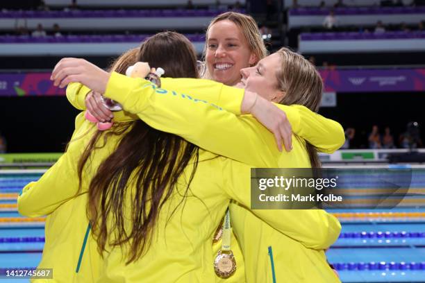 Gold medalists, Kaylee McKeown, Chelsea Hodges, Emma McKeon and Mollie O'Callaghan of Team Australia react during the medal ceremony for the Women's...