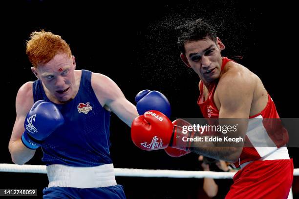 Aaron Bowen of Team England competes against Ashish Kumar of Team India during the Men’s Boxing Over 75kg-80kg Light Heavyweight Quarter-Final match...