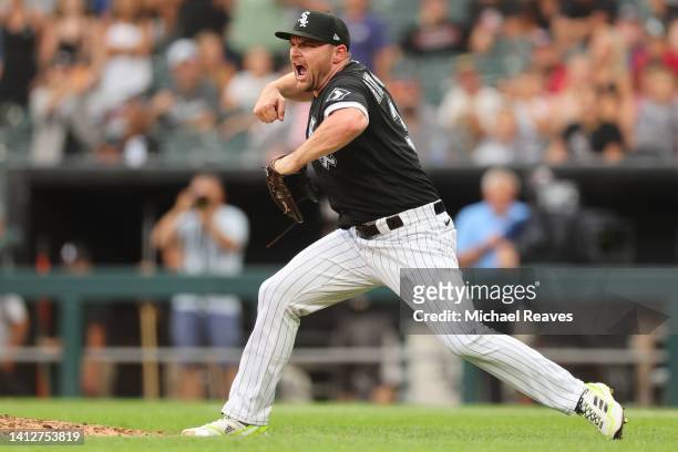 Liam Hendriks of the Chicago White Sox celebrates the final out to defeat the Kansas City Royals 4-1 at Guaranteed Rate Field on August 03, 2022 in...