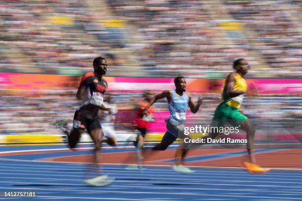 Che Lara of Team Trinidad & Tobago and Nathon Allen of Team Jamaica compete during the Men's 400m Round 1 heats on day six of the Birmingham 2022...
