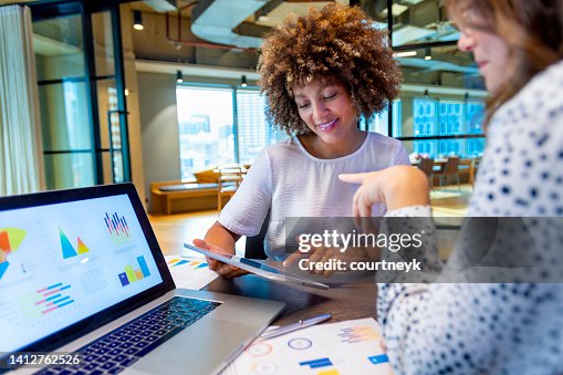 Business colleagues having a conversation. Business colleagues having a conversation.