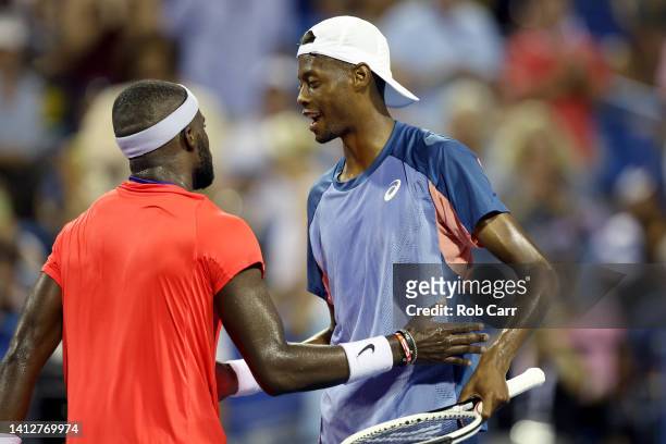 Frances Tiafoe of the United States shakes hands with Christopher Eubanks of the United States after defeating him in straight sets during Day 5 of...