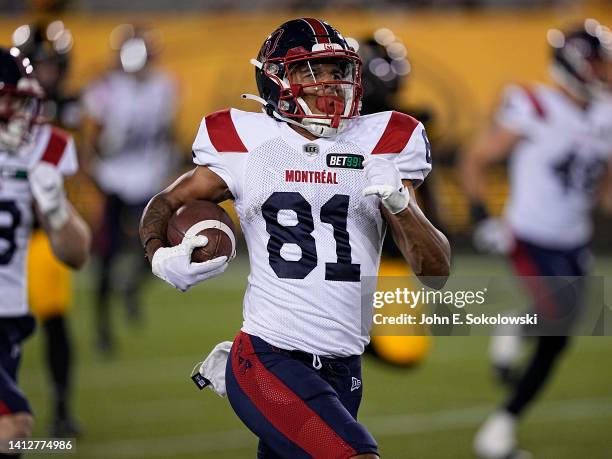 Tyson Philpot of the Montreal Alouettes returns a punt against the Hamilton Tiger-Cats at Tim Hortons Field on July 28, 2022 in Hamilton, Canada.