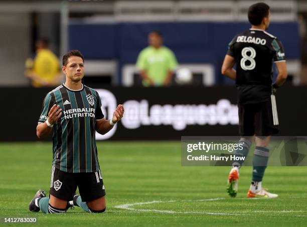 Javier Hernandez of Los Angeles Galaxy prays before the game against the Guadalajara Chivas during the Leagues Cup Showcase 2022 at SoFi Stadium on...