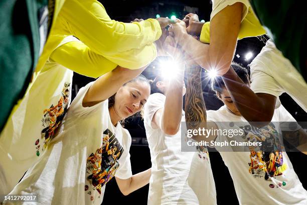 Sue Bird of the Seattle Storm gathers with her teammates before the game against the Minnesota Lynx at Climate Pledge Arena on August 03, 2022 in...