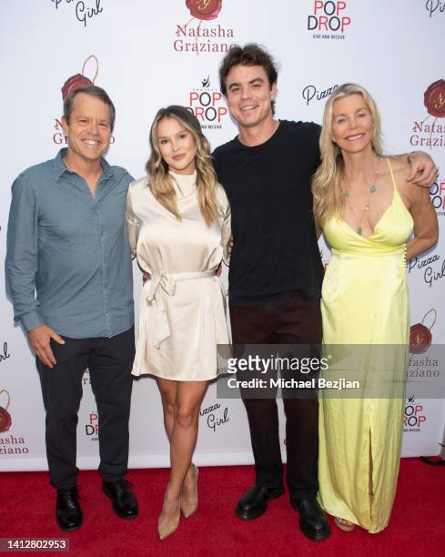 Tom McCarthy, Kinsey Wolanski, Tom McCarthy, and Stacy McCarthy arrive at the "Be It Until You Become It" book party benefiting the Project Pop Drop...