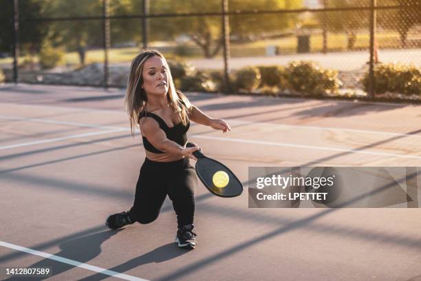 pickle ball girl - little people stock pictures, royalty-free photos & images