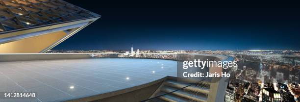 skyscraper roof  and night view of the city (3d rendered) - rooftop new york photos et images de collection