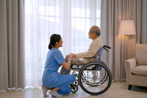 nurse take care senior man in the bedroom. - old age home stock pictures, royalty-free photos & images