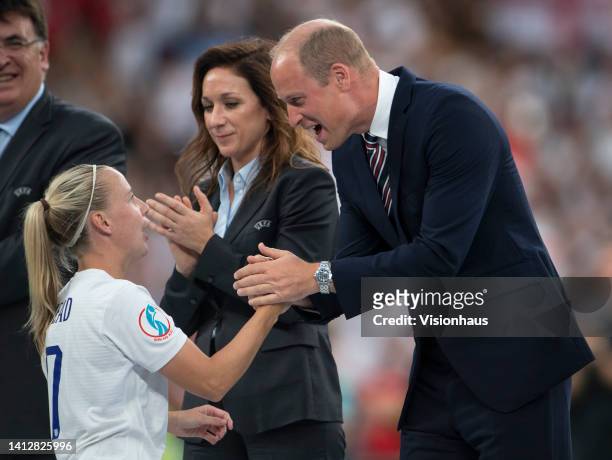 His Royal Highness, Prince William with Beth Mead of England after the UEFA Women's Euro England 2022 final match between England and Germany at...