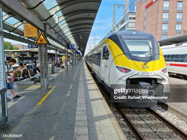 bahnhof freiburg - freiburg im breisgau stock-fotos und bilder